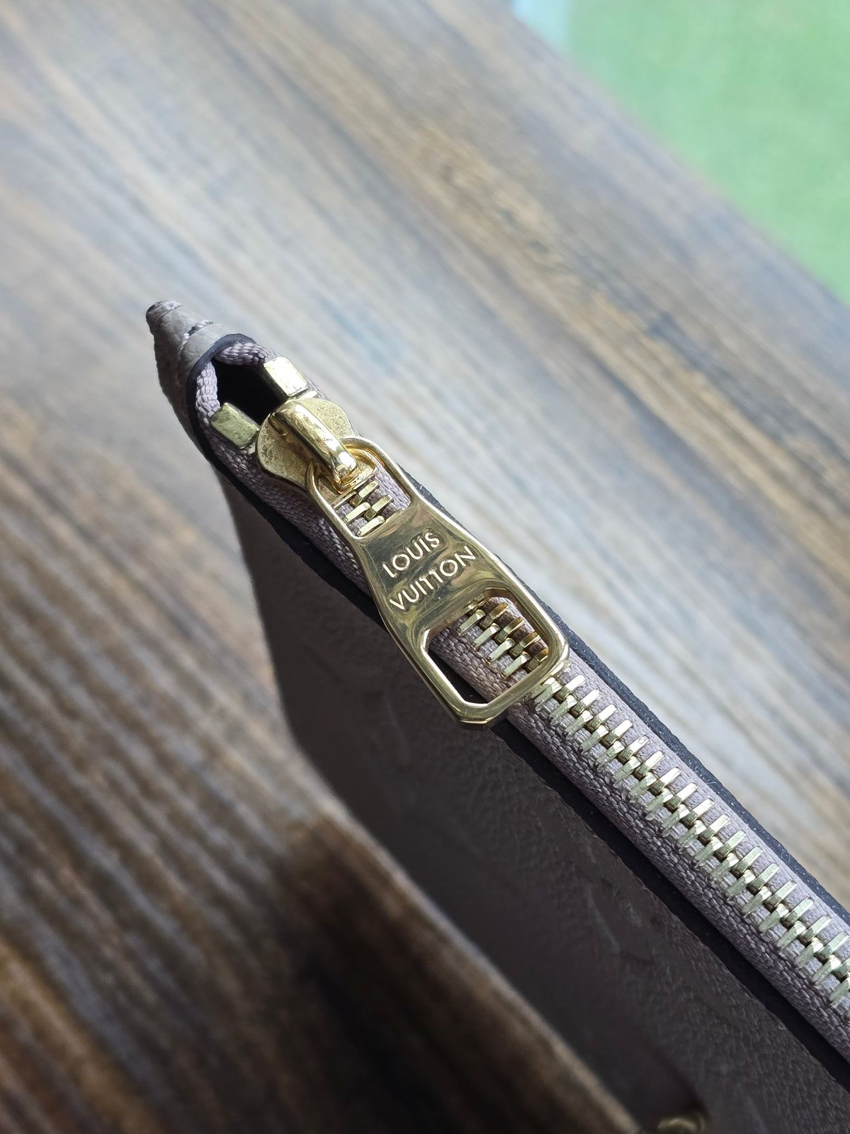 Louis Vuitton Neverfull Pochette Giant Monogram Empreinte Leather (Taupe)