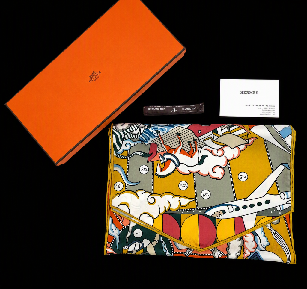 Hermes Silk Muffler Scarf in the "L'Epopee d'Hermes" Design